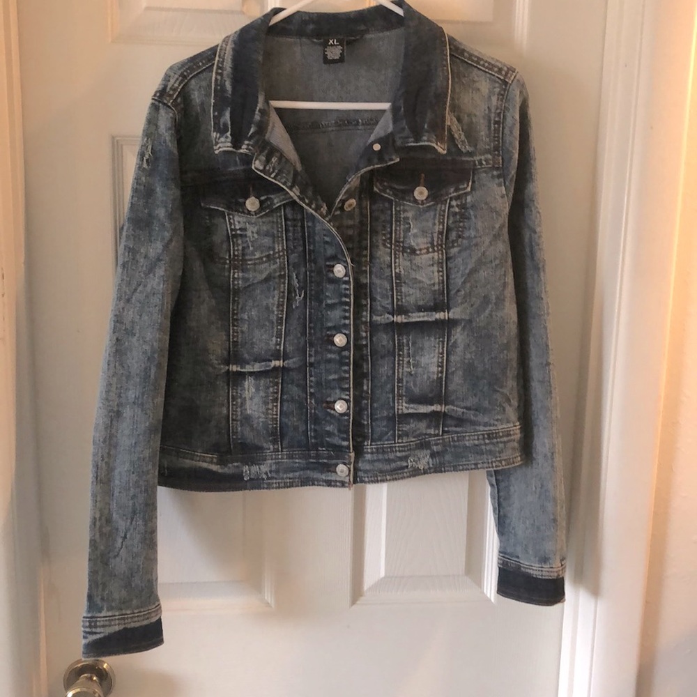 Distressed denim jacket